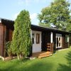 Wochenendhaus Ferienhaus Blockhaus 47,1m² mit lasierten Fenstern und Türen im Wunschfarbton