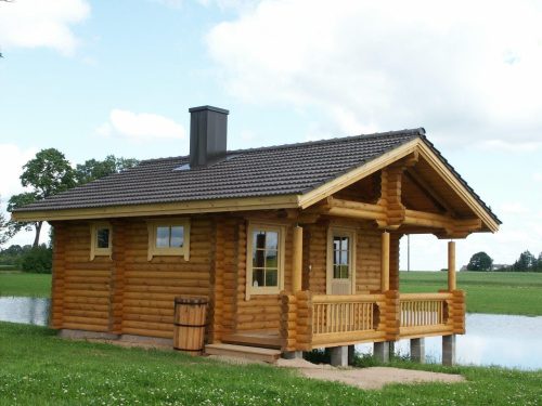 190mm Durchmesser Rundholz Ferienhaus Blockhaus 25m² + 8,7m² Terrasse mit lasierten Fenstern und Türen im Wunschfarbton