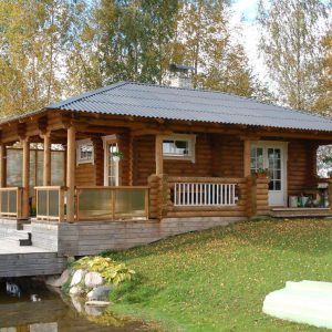 190mm Durchmesser Rundholz Ferienhaus Blockhaus 31,6m² + 24,7m² L-Form Terrasse, Fenstern, Türen im Wunschfarbton 