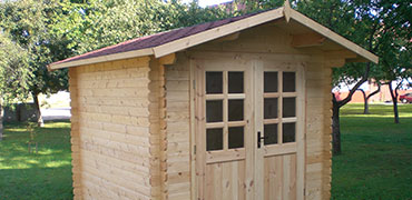 Das Gartenhaus aus Holz als Spielhaus für Kinder